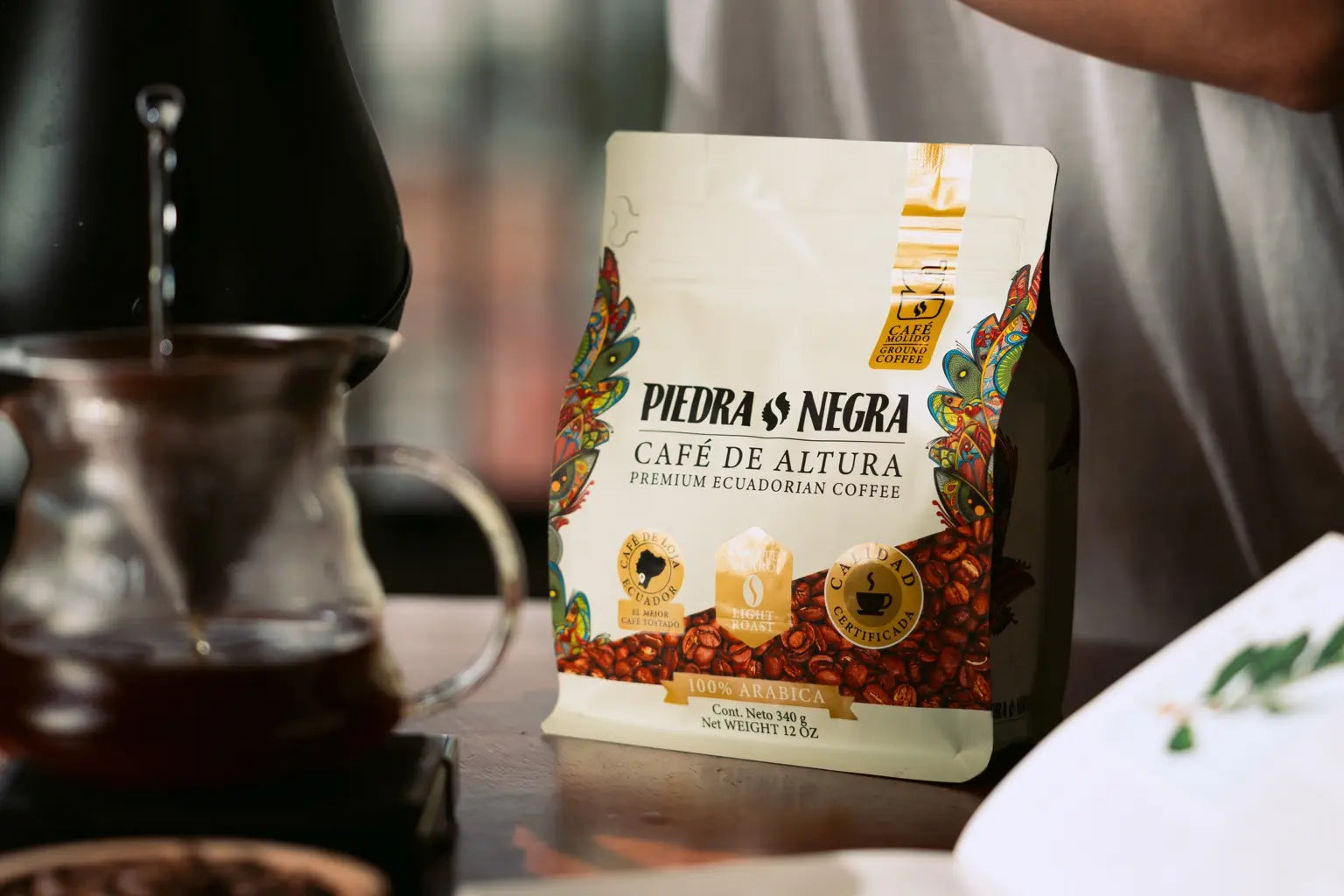 Light Roast bag beside a filter coffee preparation